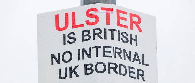 A sign was displayed in a port in Northern Ireland to protest against the border between the UK and Ulster.