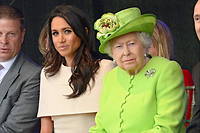 La reine Elizabeth II et la duchesse de Sussex, en juin 2018. La souveraine a orchestre la replique apres l'interview fracassante donnee par son petit-fils et son epouse.
