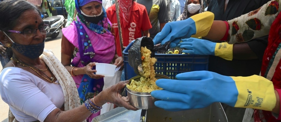 Virus: record de contaminations en Inde, les JO a nouveau en question