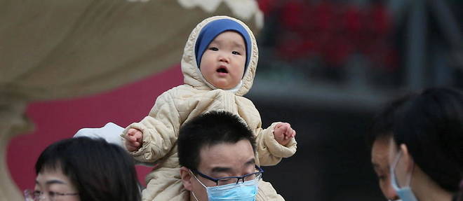 Un bebe, le 11 mars 2021, a Pekin. 
