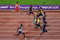 Usain Bolt (troisieme en partant du haut) produit son effort mais sait qu'il ne remportera pas la victoire lors de la finale du 100 m aux championnats du monde d'athletisme de Londres.
