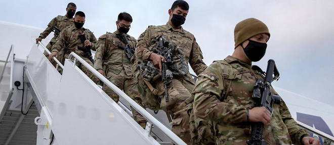 Des soldats americains, deployes en Afghanistan, de retour chez eux apres neuf mois de mission. Le retrait des troupes americaines d'Afghanistan doit etre finalise a la fin du mois d'aout.
