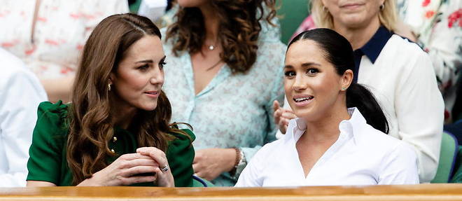 Kate Middleton et Meghan Markle au match de Serena Williams, lors du tournoi de tennis de Wimbledon, le 13 juillet 2019. 

