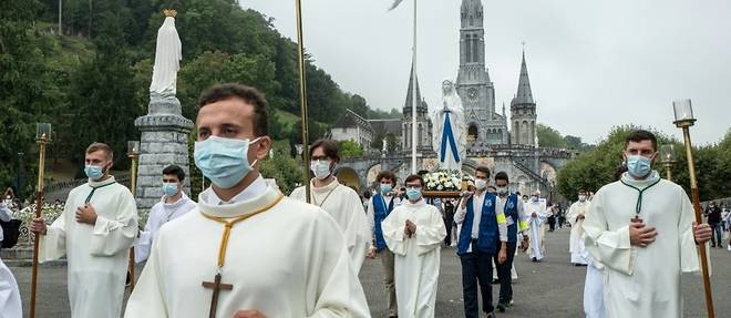 Malgre le Covid, pres de 9.000 fideles a Lourdes pour l'Assomption celebrant la "fraternite"