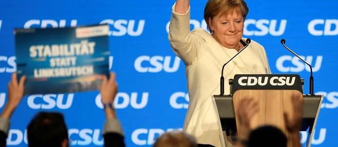 Allemagne: Merkel jette toutes ses forces dans l'arene avant un vote indecis