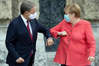 Angela Merkel et Armin Laschet en aout, a Dusseldorf. L'ex-chanceliere et le leader de la CDU laissent derriere eux un parti en proie au doute.

