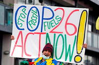 Un militant pour le climat à Glasgow durant la COP26.
