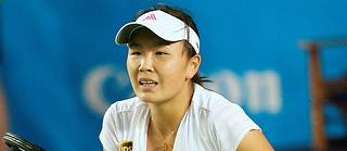 
La joueuse de tennis Peng Shuai en plein match. 

