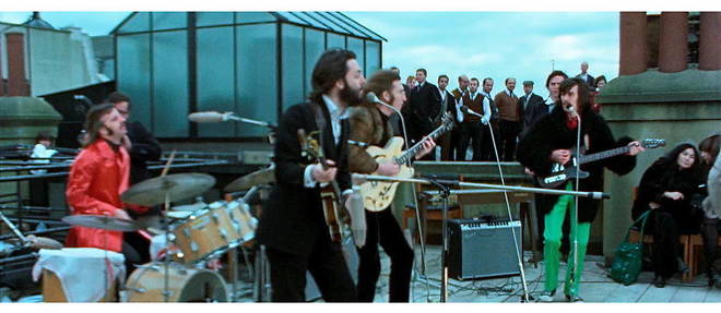 Le fameux concert des Beatles sur le toit de leur societe Apple 
