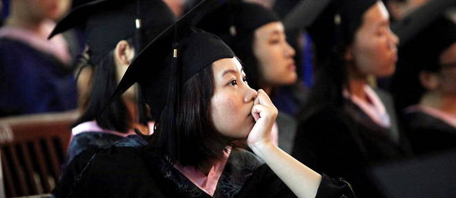 Des etudiants chinois lors de la remise des diplomes de l'universite de Xiamen.
