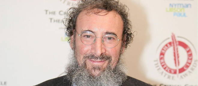 FILE - Actor Antony Sher poses for photographers after winning the best Shakespearean performance award at the Critics' Circle Theatre Awards in central London Jan. 27, 2015. Sher, one of the most acclaimed Shakespearean actors of his generation, has died aged 72, the Royal Shakespeare Company said Friday, Dec. 3, 2021. Sher had been diagnosed with terminal cancer earlier this year. (Grant Pollard/Invision/AP, file)/LLT112/21337496805434/012715110278, 21334631, FILE/2112031455