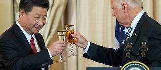 Xi Jinping et Joe Biden lors d'une rencontre à Washington en 2015. Les Etats-Unis comme la Chine sont des champions de la dette. 

