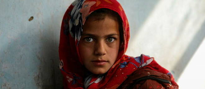 Une petite fille dans une ecole publique de Kaboul, le 18 novembre 2021. Depuis le retour au pouvoir des talibans, les filles sont privees d'ecole a partir de 12 ans, age de la puberte, dans la plupart des provinces.
