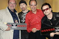 Le producteur Gerard Drouot, au milieu en chemise rouge, est mort a l'age de 69 ans des suites d'une leucemie.
