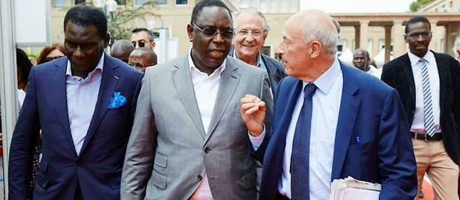 Avec le concours du Cercle des economistes preside par Jean-Herve Lorenzi (a droite), le Consensus de Dakar a ete mis en exergue en decembre 2019 par le president senegalais Macky Sall (a gauche) avec d'autres chefs d'Etat. Va-t-il pouvoir le mettre en oeuvre pendant sa presidence de l'Union africaine en 2022 ? 

