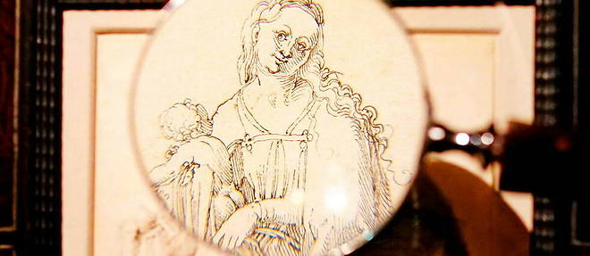 << Vierge a l'enfant >>, un dessin inedit a la plume et a l'encre noire d'Albrecht Durer, a la Agnew's Gallery de Londres.
