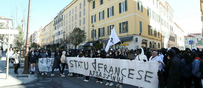 << Etat assassin >>, sur une large banderole lors d'une manifestation a Ajaccio devant la prefecture, le 10 mars 2022.  
