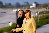 Vladimir Poutine et Angela Merkel en 2007, lors du sommet du G8 à Heiligendamm en Allemagne.

