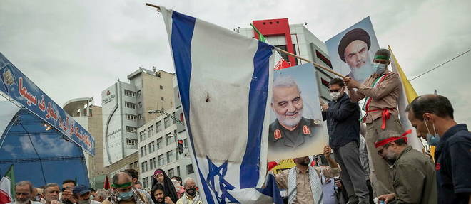 Des manifestants iraniens participent a la traditionnelle Journee de Jerusalem consacree a la denonciation de l'Etat hebreu le 29 avril 2022.
