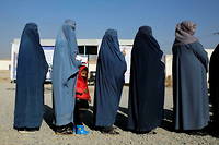 Dans un quartier de Kaboul en decembre 2021. La burqa est de nouveau obligatoire pour les femmes en Afghanistan.
