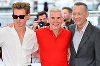 L'équipe du film « Elvis » : de gauche à droite, Austin Butler, Baz Luhrmann et Tom Hanks lors du photocall à Cannes.  
