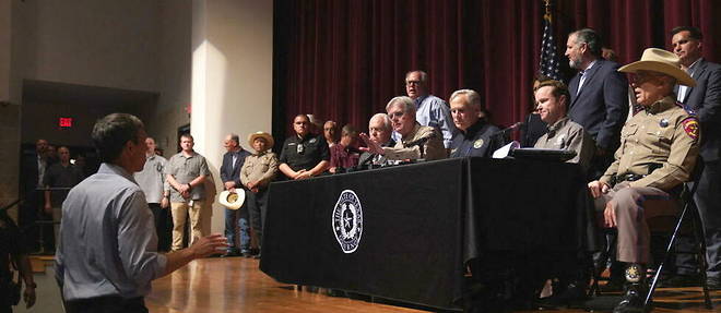 Democrat Beto O'Rourke interrupts Republican Governor Greg Abbott's press conference after the shooting at the Uvalde school in Texas.
