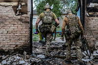 Des soldats ukrainiens dans la région de Sloviansk le 12 juillet 2022.
