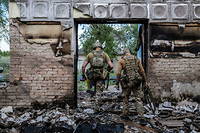 Des soldats ukrainiens dans la region de Sloviansk le 12 juillet 2022.

