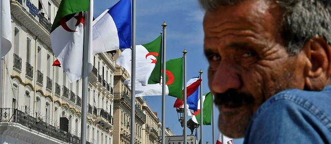 Dans la capitale, Alger, les habitants se preparent a accueillir le president francais Emmanuel Macron, pour une visite de trois jours  lourde d'enjeux.
