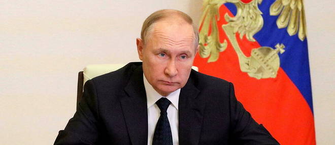 Le president russe Vladimir Poutine dans son bureau a Moscou le 24 aout 2022.
