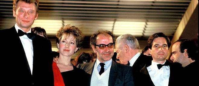 Johnny Hallyday, Nathalie Baye , Jean-Luc Godard et Jean-Pierre Leaud a Cannes pour le film Detective.  
