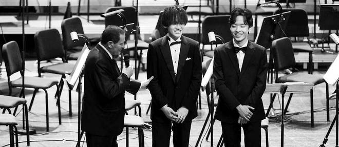 Hyuk Lee, 22, and Masaya Kamei, 20, tied for first prize in the famous piano competition
