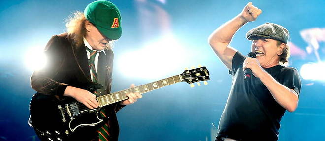 Brian Johnson (a droite sur la photo) et le mythique guitariste soliste de AC/DC, Angus Young, au Dodger Stadium de Los Angeles (Californie), le 28 septembre 2015.
