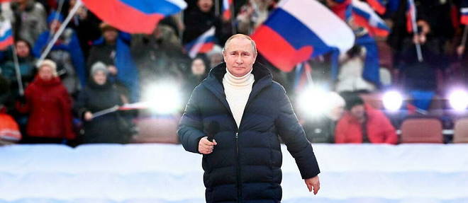 Le president russe Vladimir Poutine lors d'une ceremonie marquant le huitieme anniversaire de l'annexion de la Crimee a la federation de Russie, le 18 mars 2022 a Moscou. 