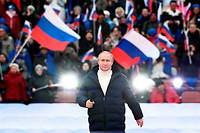Le président russe Vladimir Poutine lors d'une cérémonie marquant le huitième anniversaire de l'annexion de la Crimée à la fédération de Russie, le 18 mars 2022 à Moscou.

