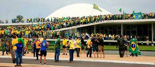 Des supporteurs de l’ancien président Jair Bolsonaro envahissent le Congrès national (Parlement brésilien), à Brasilia, le 8 janvier 2023.

