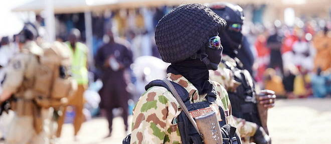 Des soldats nigerians patrouillent en decembre 2022 a Ngarannam, un village longtemps aux mains des terroristes de Boko Haram

