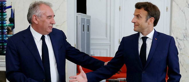 Modem leader Francois Bayrou and President Emmanuel Macron at the Elysee Palace in Paris on June 21, 2022.