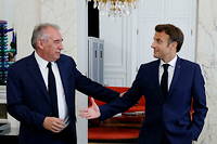 Le leader du MoDem François Bayrou et le président Emmanuel Macron à l'Elysée, à Paris, le 21 juin 2022.
