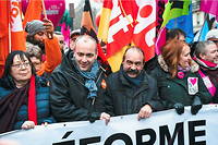 Le secrétaire général de la CFDT Laurent Berger et le secrétaire général de la CGT Philippe Martinez en tête de la manifestation contre la réforme des retraites,  à Paris, le 19 Janvier 2023.
