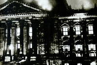 Photographic print of the Reichstag Building on Fire, set by Marinus van der Lubbe (1909-1934) a Dutch council communist. Dated 20th Century (Photo by Ann Ronan Picture Library / Ann Ronan Picture Library / Photo12 via AFP)