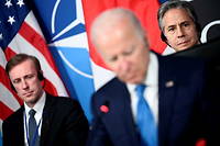 Le président américain Joe Biden aux côtés du secrétaire d'État Antony Blinken et du conseiller américain à la sécurité nationale Jake Sullivan (à gauche), lors d'un sommet de l'Otan, à Madrid, le 29 juin 2022. 
