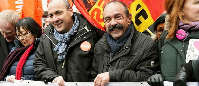 Laurent Berger, secretaire general de la CFDT, et Philippe Martinez, secretaire general de la CGT, lors d'un rassemblement contre la reforme des retraites, a Paris, le 19 janvier 2023. 
