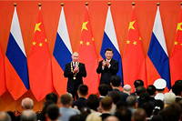 Le président russe Vladimir Poutine  et le président chinois Xi Jinping, à Pékin, en 2018.

