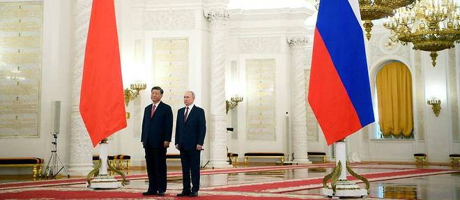 Le president russe Vladimir Poutine et le president chinois Xi Jinping au Kremlin, a Moscou, le 21 mars 2023.
