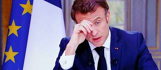 Le president Emmanuel Macron lors d'une interview televisee depuis l'Elysee, a Paris, le 22 mars 2023.
