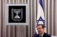 « Au nom de l’unité du peuple d’Israël   (...), je vous appelle à stopper immédiatement » le processus législatif, a déclaré Isaac Herzog.
