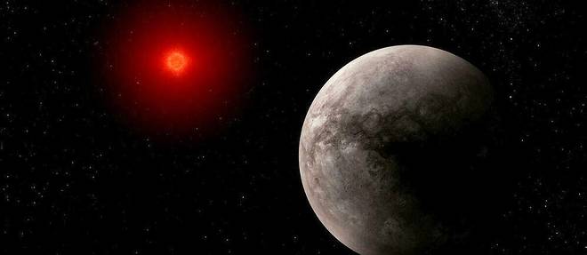 Vue d'artiste de l'exoplanete Trappist 1-b et de son etoile de type naine rouge.

