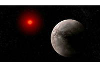 Vue d'artiste de l'exoplanete Trappist 1-b et de son etoile de type naine rouge.
