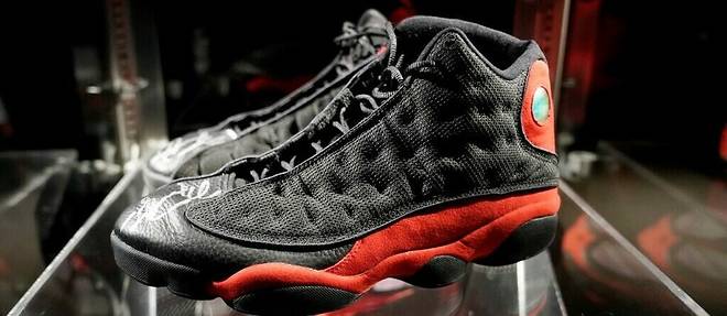 A pair of Air Jordan XIII worn by NBA legend Michael Jordan during his last championship final in 1998 with the Chicago Bulls sold for a record $2.2 million on Tuesday.
